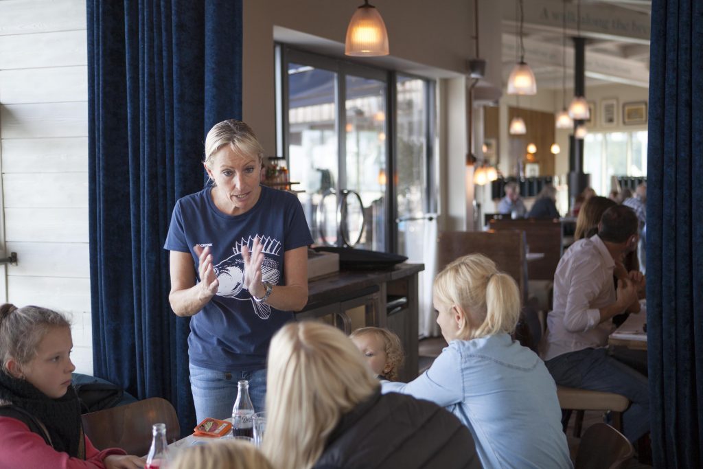 Waitress taking orders at RockFish