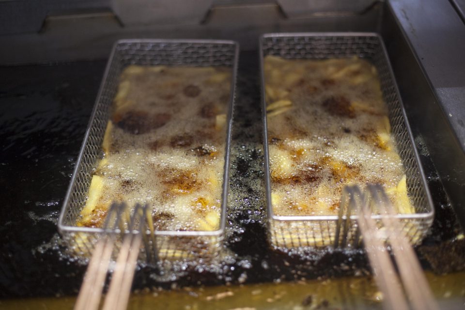 Chips at RockFish being cooked in the fryer