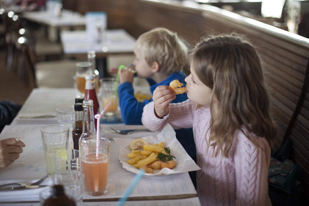 Children enjoying lunch and RockFish