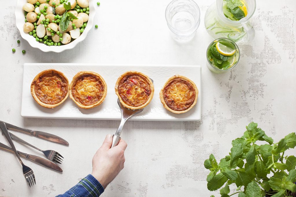 Photo of four quiches ready to be served from Crantock Bakery in Cornwall