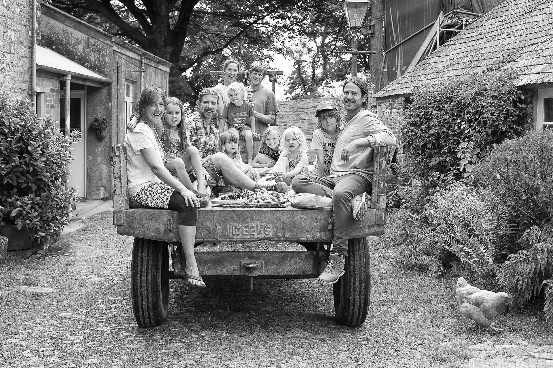 Families on a rural farm trailer