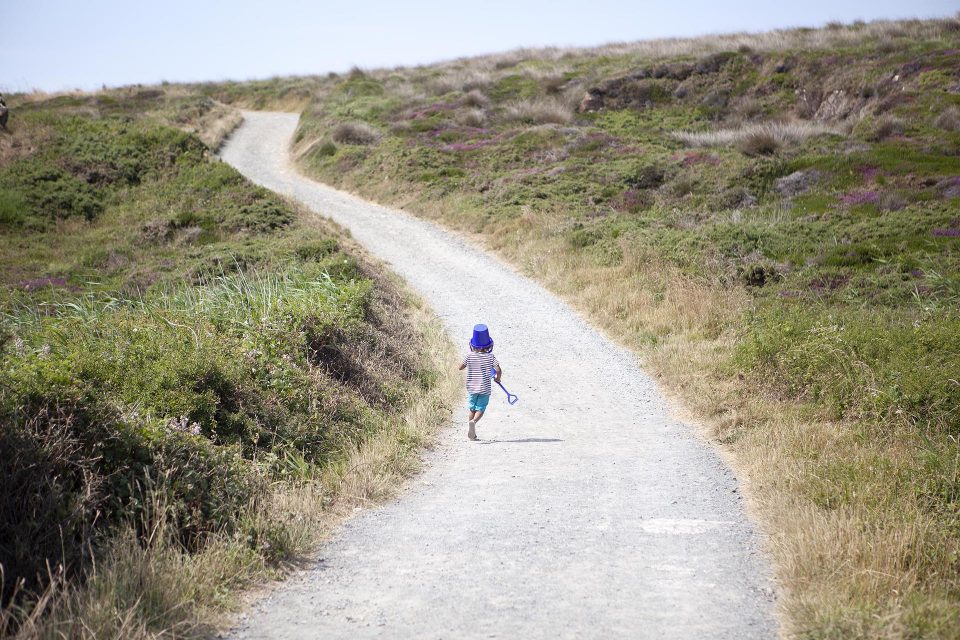 Child running to the beach