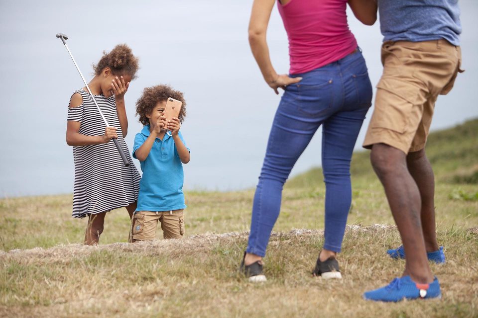 Family playing crazy golf
