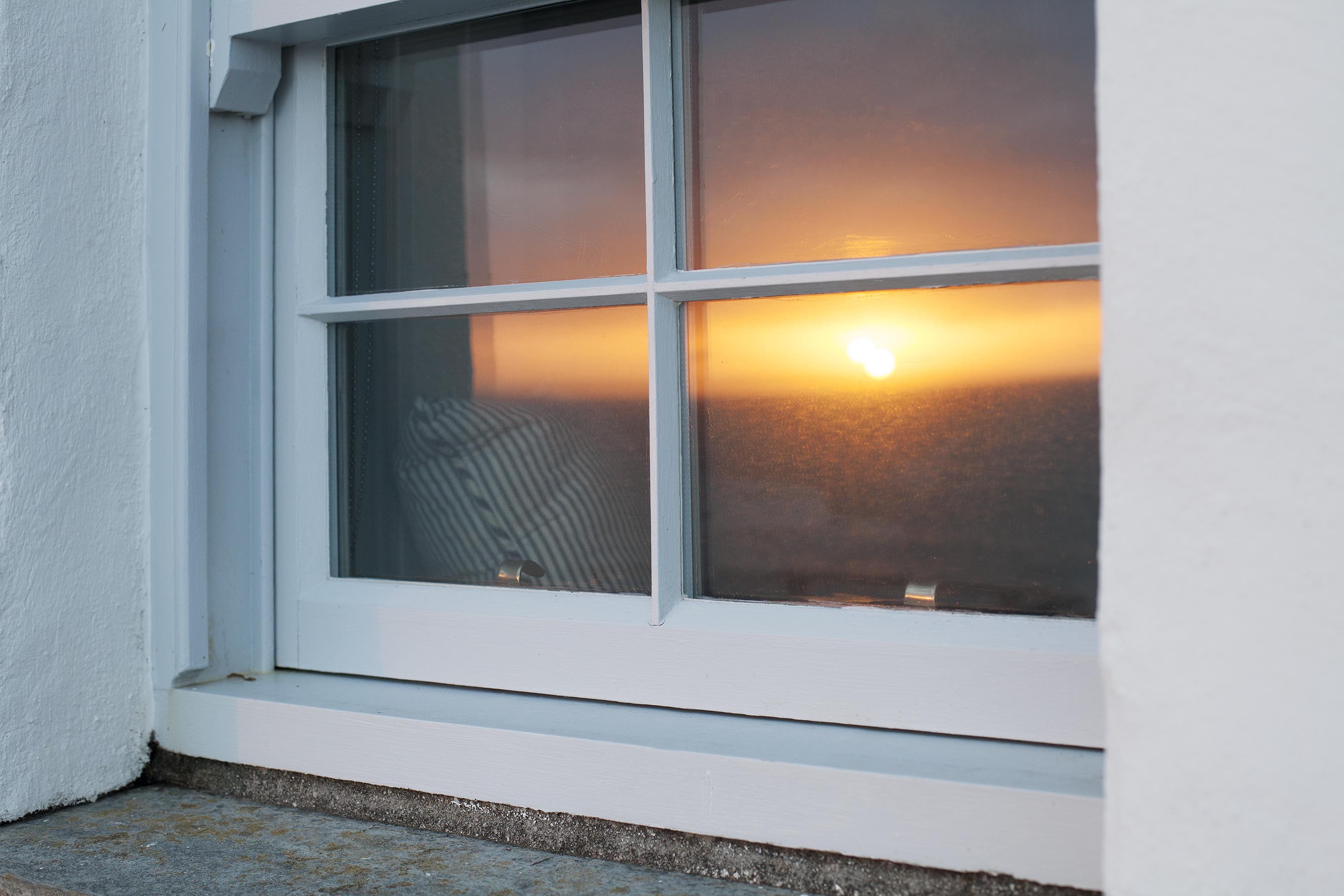 Sunset reflection on a holiday home