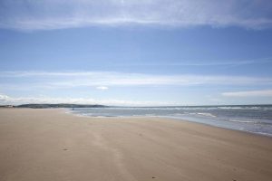 Beautiful Brynowen beach in Wales family holiday